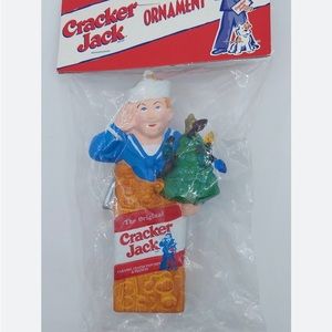 1999 Cracker Jack box with sailor ornament